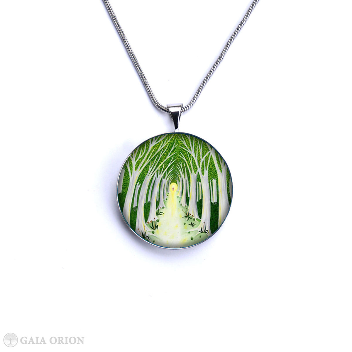 A Meaningful Life Necklaces featuring a green forest path design on a sterling silver medallion pendant.