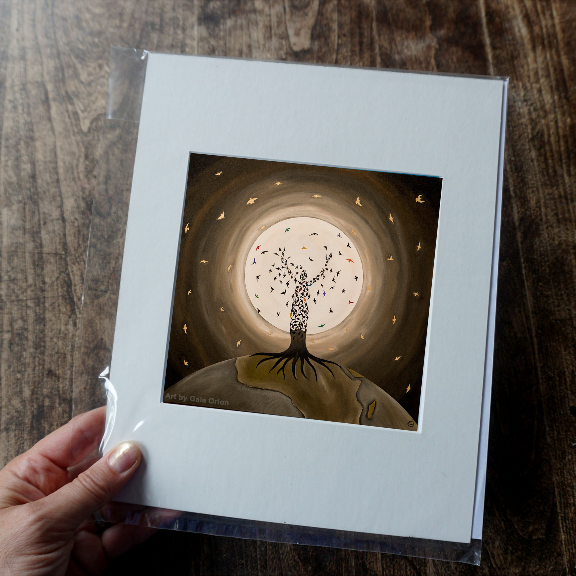 FLIGHT OF THE SOUL print showing a tree transforming into birds beneath a glowing full moon on premium paper.