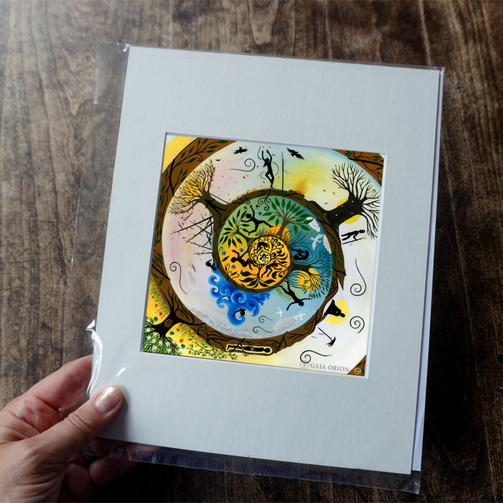 Life Journey - Prints on Paper showing seasonal cycle with human figures, trees, and nature in a circular design.