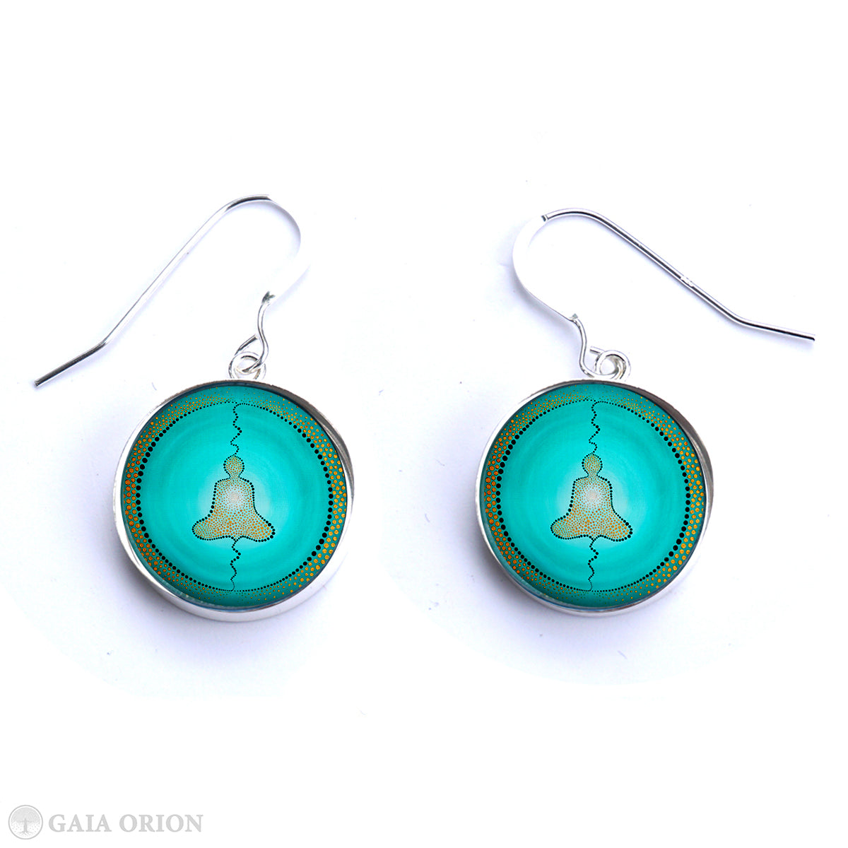 Earrings of a person meditation with light at the heart center