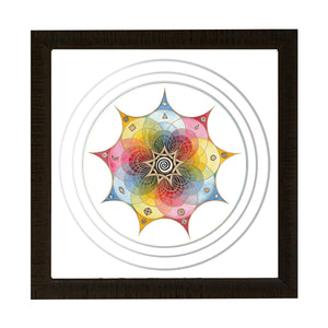 A framed watercolour of a rainbow mandala with a black white and gold spiral at the centre