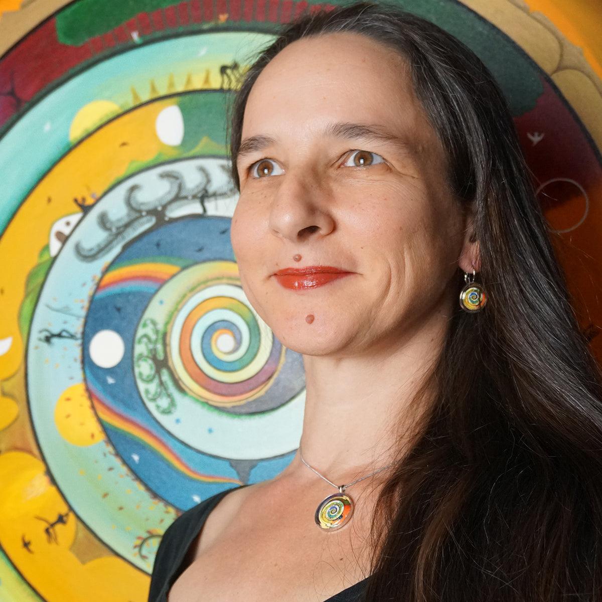 Wholeness Earrings with colorful spiral art on sterling silver medallions, handmade, UV resistant, and anti-allergic.