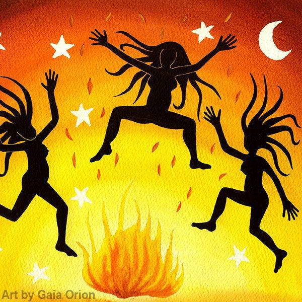 Dancing Wild Eco Greeting Card shows silhouettes of women joyfully dancing around a fire under stars and a crescent moon.