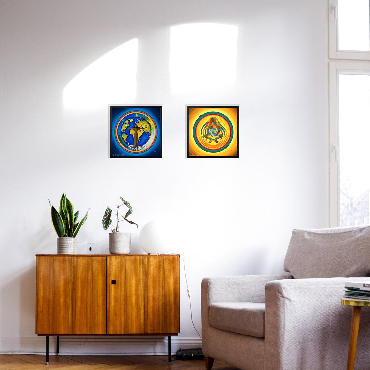 two prints on canvas on a wall about mother earth the planet peace and love