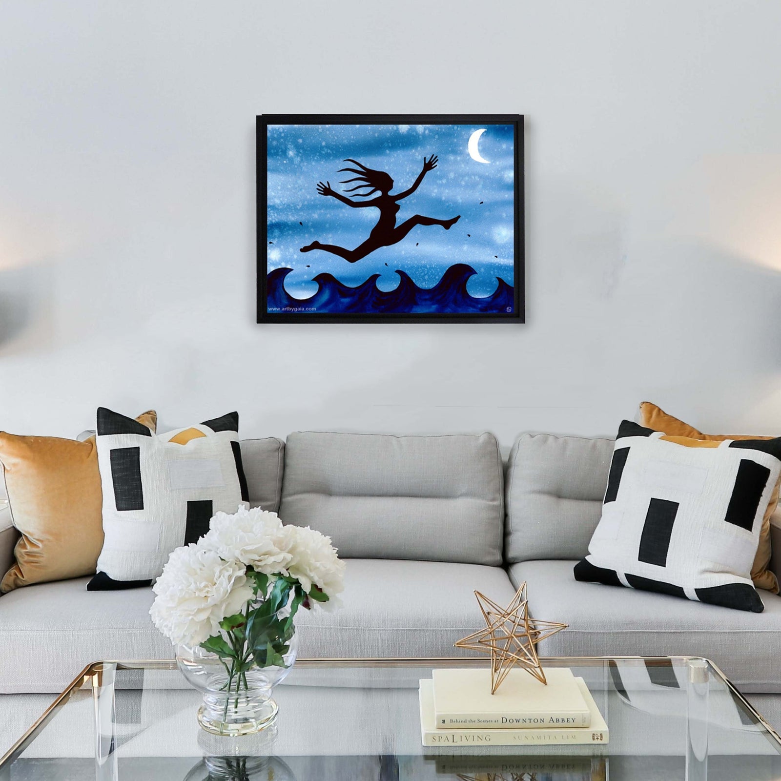 I Feel Free! - Canvas print of a silhouette leaping over waves against a vibrant blue sky background.