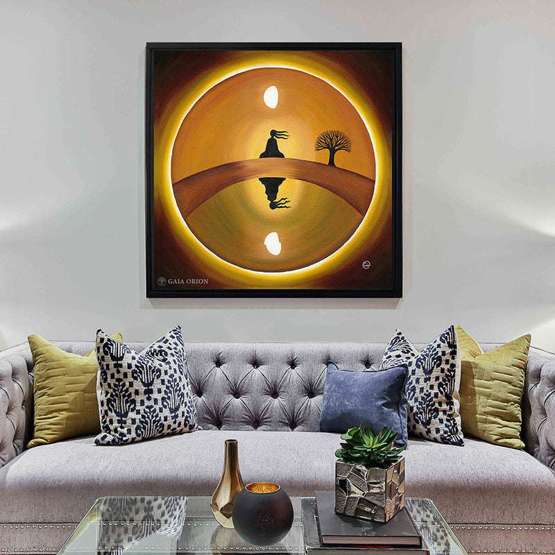 A large framed print on canvas a circle brown and yellow painting with a woman silhouette attaining by a buddha treenirvana
