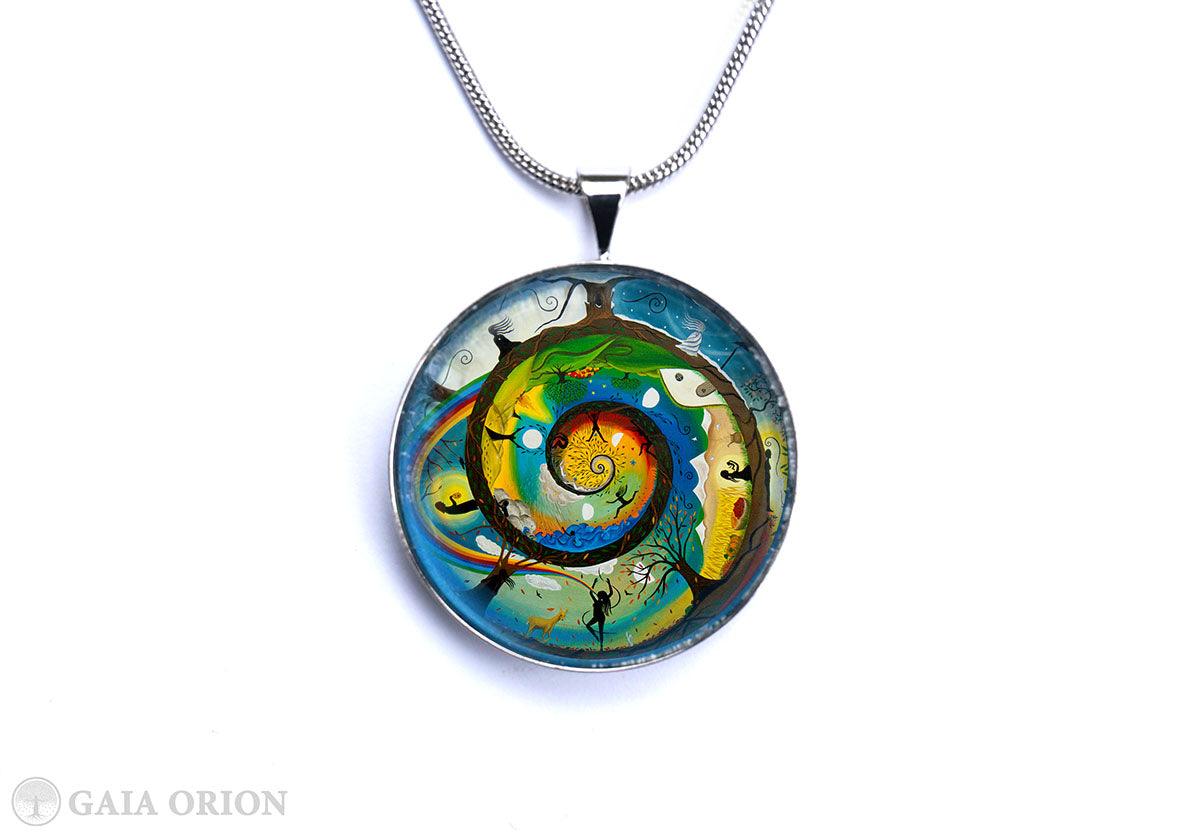 Her Journey Necklaces featuring a colorful spiral design on a silver medallion with a 16-inch snake chain.