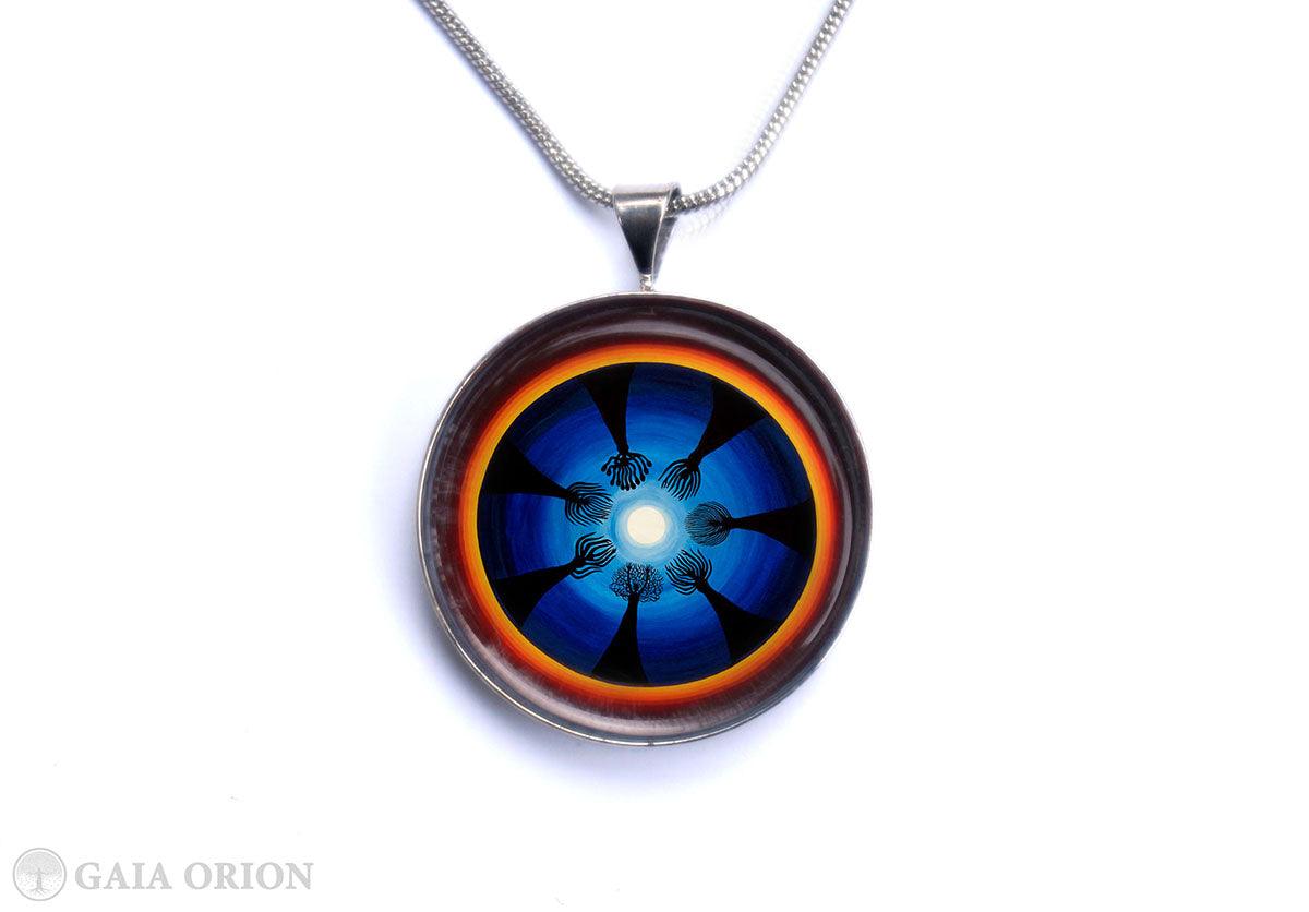 Moon Ritual Necklaces featuring a mandala design celebrating female bodies and lunar cycles on a silver chain.