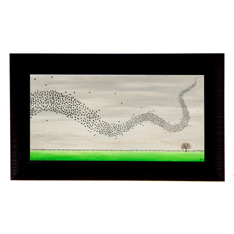 Murmuration - Oil on Canvas - 30 x 60 cm depicts a flock of starlings swirling over a lone tree in a green field.