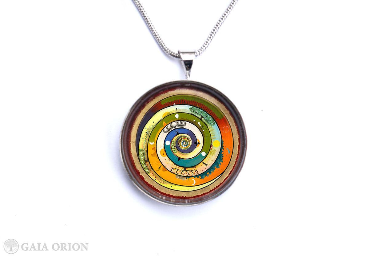 Wholeness Necklaces featuring a colorful spiral design on a sterling silver medallion with a 16” snake chain.